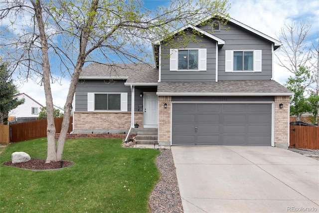 tri-level home with brick siding, fence, driveway, and a garage