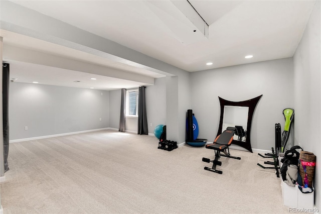 exercise area featuring carpet floors, recessed lighting, and baseboards