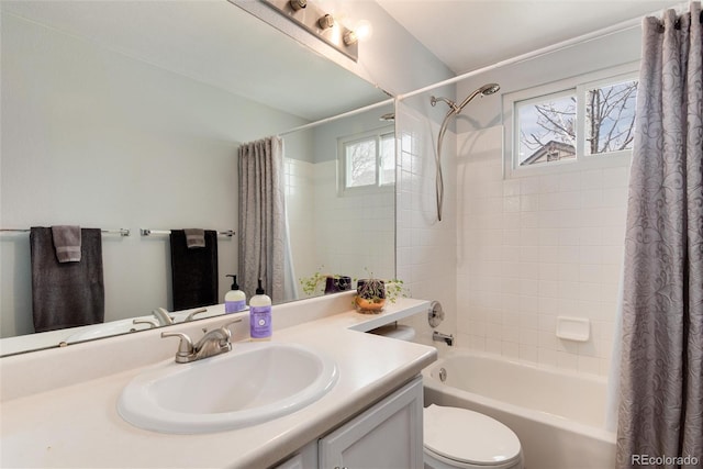 full bath featuring vanity, shower / bath combo, and toilet