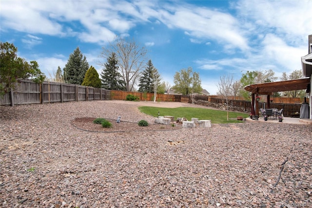 view of yard featuring a fenced backyard and a patio area