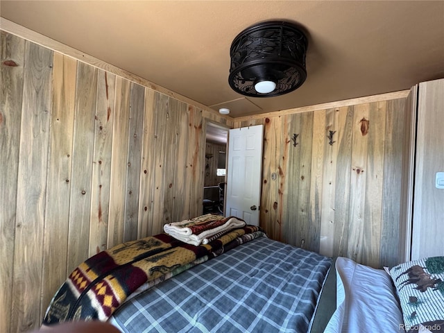582 Pactolus Lake Rd, Black Hawk, CO 80422 - bedroom featuring wood walls