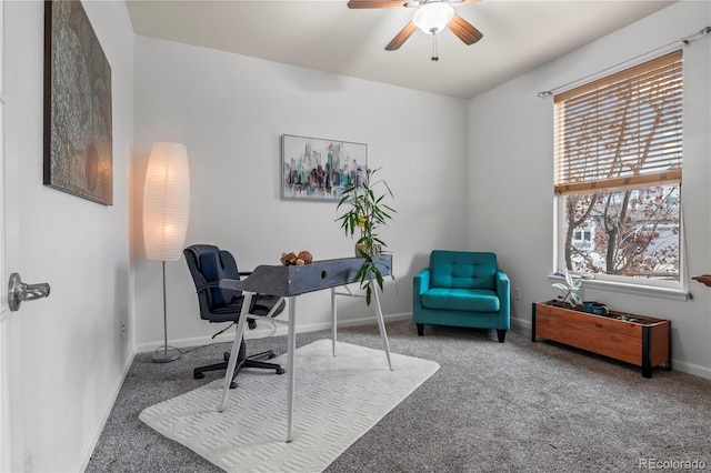 carpeted home office with ceiling fan