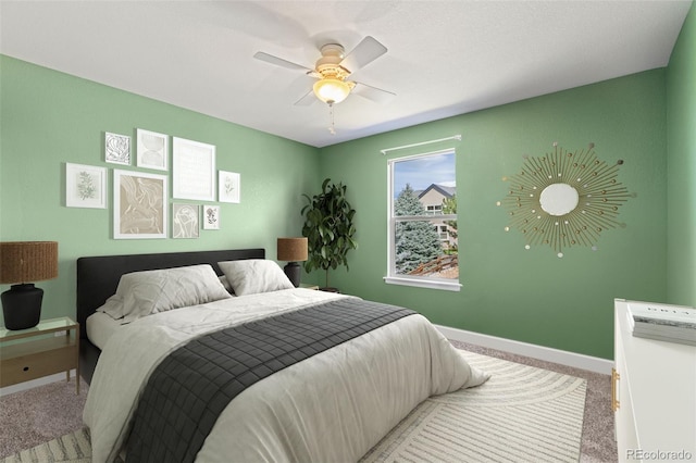 bedroom with light carpet and ceiling fan