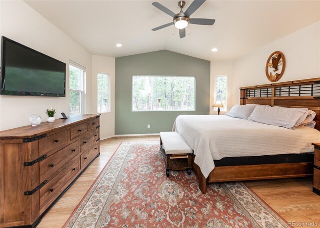 15948 Huckleberry Hts, Colorado Springs, CO 80908 - bedroom featuring baseboards, light wood-type flooring, recessed lighting, a ceiling fan, and vaulted ceiling