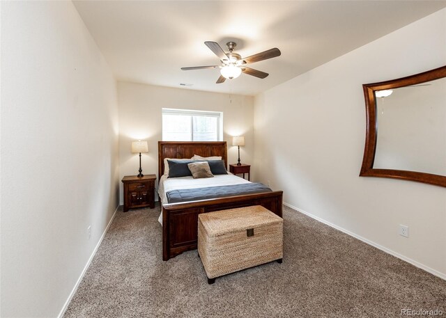 15948 Huckleberry Hts, Colorado Springs, CO 80908 - bedroom with light colored carpet, a ceiling fan, and baseboards