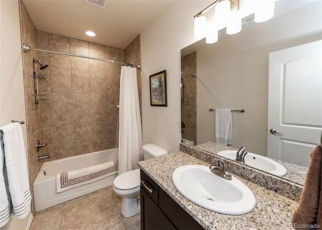 15948 Huckleberry Hts, Colorado Springs, CO 80908 - full bath with tile patterned flooring, vanity, toilet, shower / tub combo, and visible vents