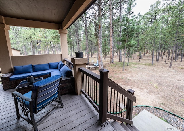 15948 Huckleberry Hts, Colorado Springs, CO 80908 - wooden deck with an outdoor hangout area