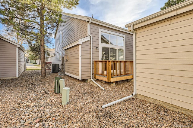 view of side of home featuring a deck