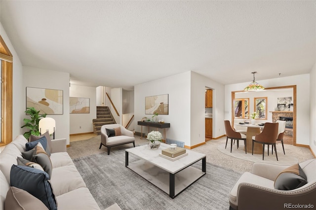 4631 Ashfield Dr, Boulder, CO 80301 - living room featuring light carpet, stairs, and a textured ceiling