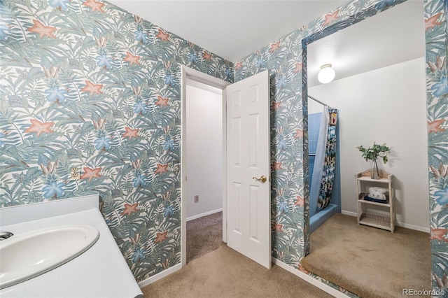 4631 Ashfield Dr, Boulder, CO 80301 - full bathroom featuring wallpapered walls, vanity, and curtained shower