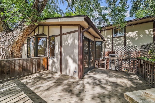 4631 Ashfield Dr, Boulder, CO 80301 - wooden deck featuring a sunroom