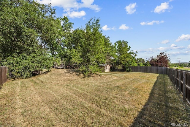4631 Ashfield Dr, Boulder, CO 80301 - fenced backyard with a storage unit