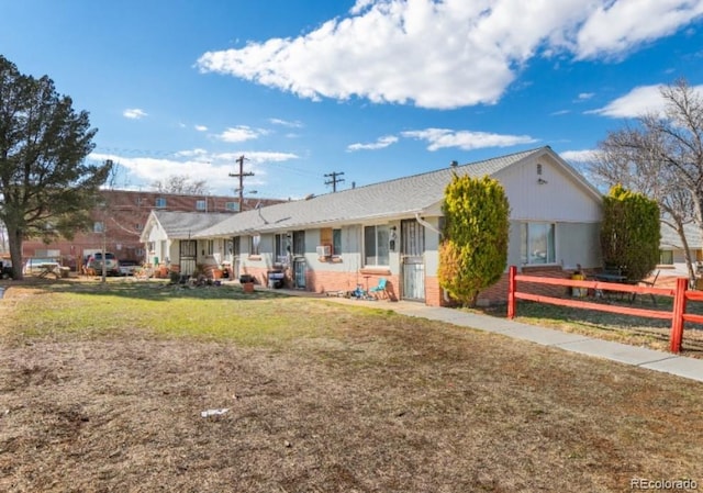 view of front of home with a front lawn