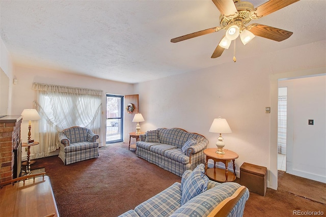 carpeted living room with a textured ceiling and ceiling fan