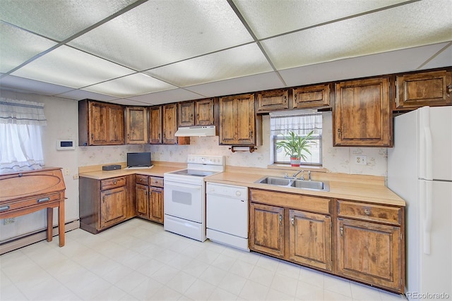 kitchen featuring a paneled ceiling, white appliances, sink, and baseboard heating