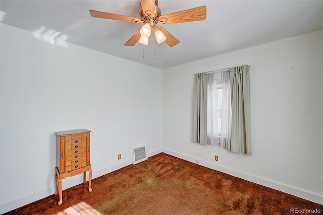 carpeted empty room with ceiling fan