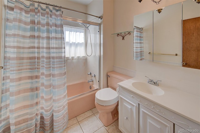 full bathroom with tile patterned floors, shower / bath combo, toilet, and vanity