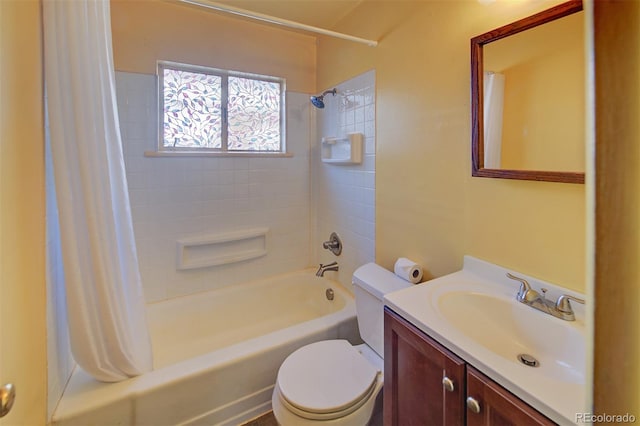 full bathroom with shower / tub combo with curtain, vanity, and toilet