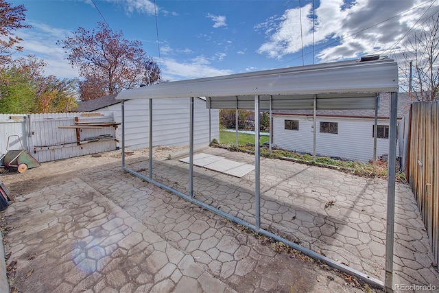 view of patio featuring a carport