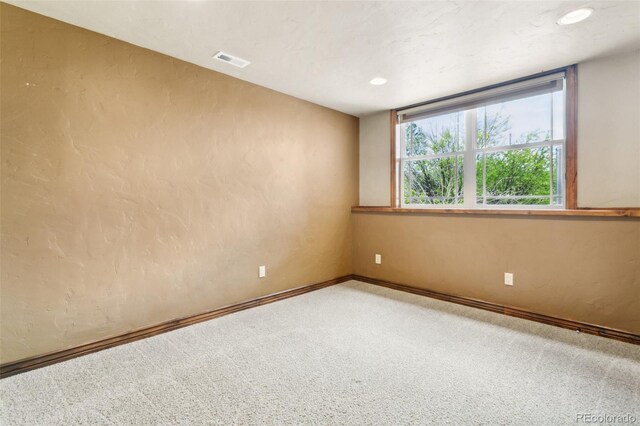 7830 Tannenbaum Rd, Colorado Springs, CO 80908 - empty room featuring carpet flooring, baseboards, a textured wall, and recessed lighting