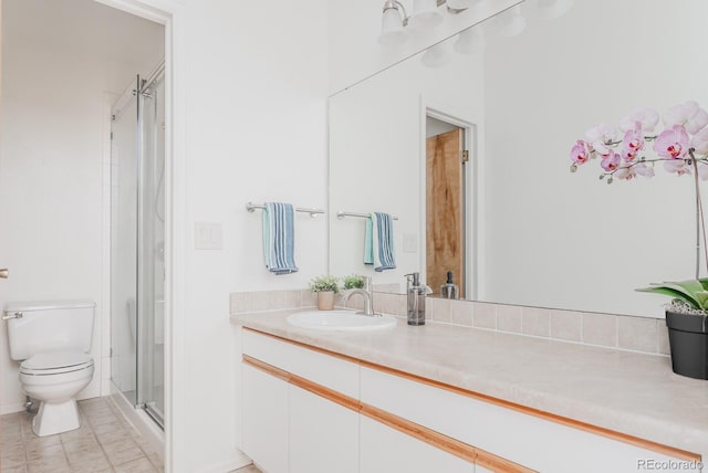 79 Huron Ct, Boulder, CO 80303 - bathroom featuring toilet, vanity, and a stall shower