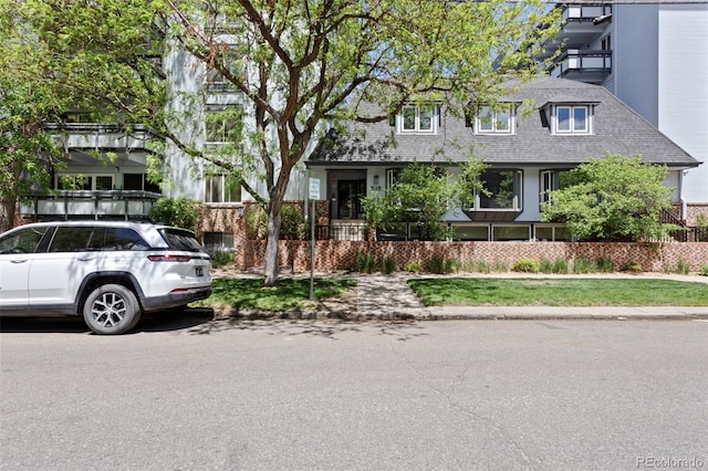 555 E 10th Ave Unit 15, Denver, CO 80203 - view of front of property with roof with shingles