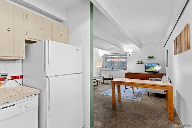 555 E 10th Ave Unit 15, Denver, CO 80203 - kitchen featuring white appliances, carpet, cream cabinets, light countertops, and backsplash