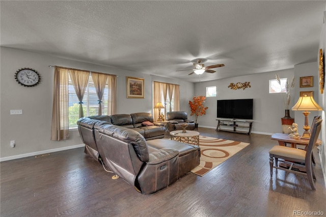 9476 Juniper Way, Arvada, CO 80007 - living room featuring ceiling fan, wood finished floors, and a textured ceiling
