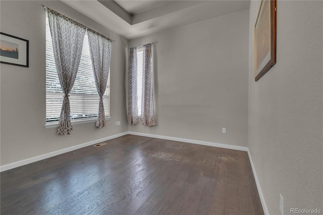 9476 Juniper Way, Arvada, CO 80007 - unfurnished room featuring dark wood finished floors and baseboards