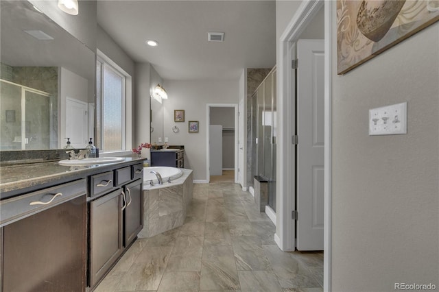 9476 Juniper Way, Arvada, CO 80007 - bathroom with a shower stall, vanity, a bath, and marble finish floors