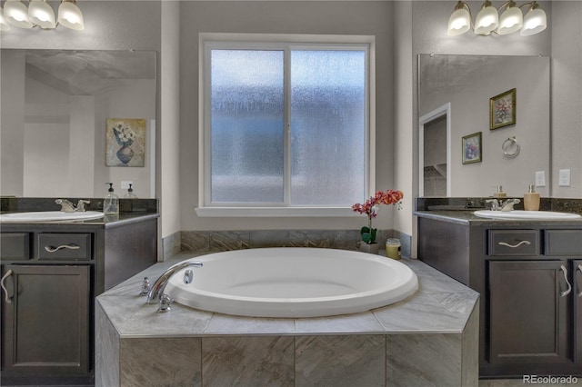 9476 Juniper Way, Arvada, CO 80007 - bathroom with a garden tub and two vanities
