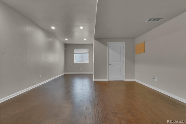 9476 Juniper Way, Arvada, CO 80007 - unfurnished room with dark wood finished floors and recessed lighting