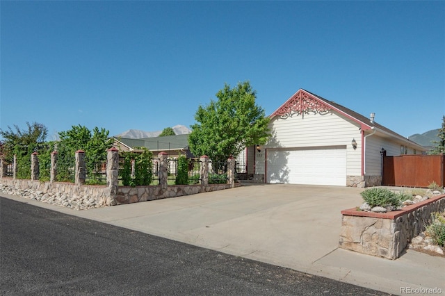 130 Windwalker Rd, Buena Vista, CO 81211 - ranch-style house featuring an attached garage, driveway, and stone siding