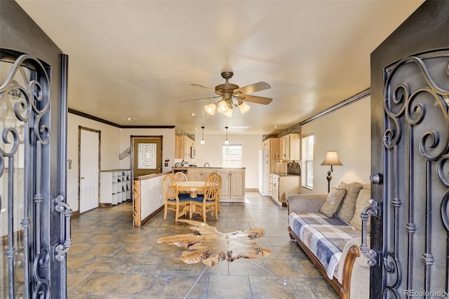 130 Windwalker Rd, Buena Vista, CO 81211 - living room with ceiling fan and ornamental molding