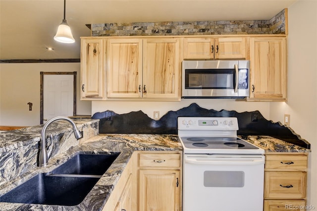 130 Windwalker Rd, Buena Vista, CO 81211 - kitchen featuring white electric stove, stainless steel microwave, light brown cabinets, and decorative light fixtures