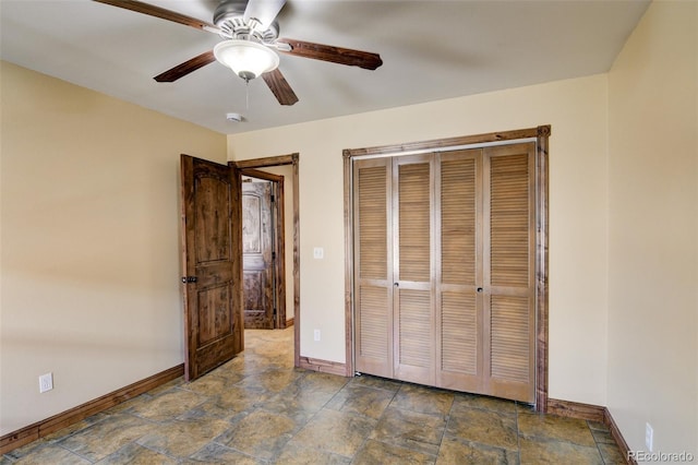 130 Windwalker Rd, Buena Vista, CO 81211 - unfurnished bedroom with stone finish floors, a ceiling fan, and a closet