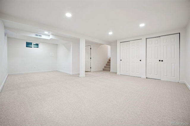 basement with light colored carpet