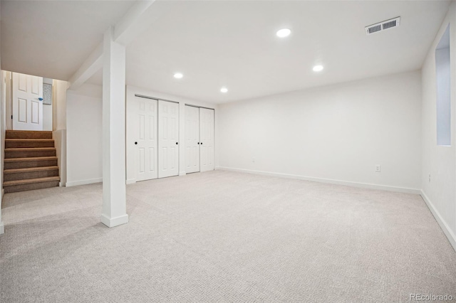 basement with light colored carpet