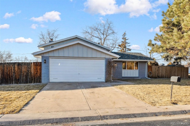 single story home featuring a garage