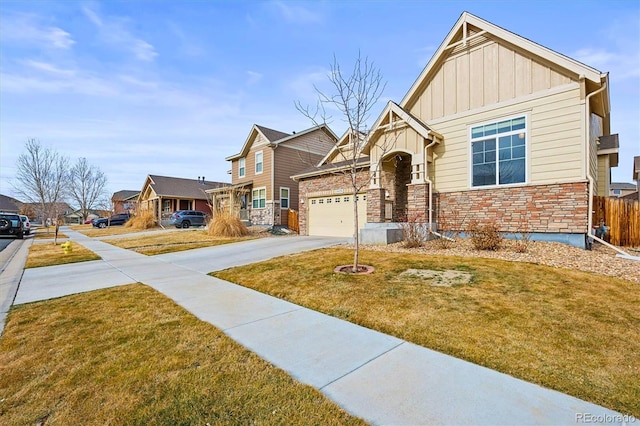 craftsman inspired home featuring concrete driveway, a residential view, board and batten siding, and a front yard