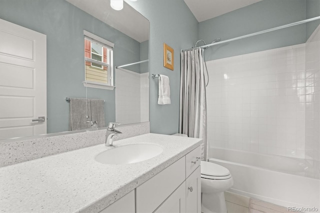 full bath featuring tile patterned floors, vanity, toilet, and shower / bath combo with shower curtain