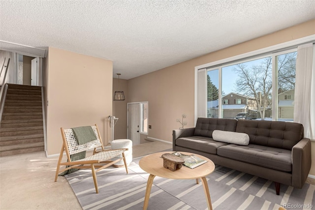 living room featuring a textured ceiling