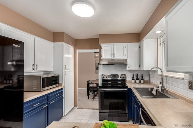 kitchen featuring blue cabinetry, white cabinetry, appliances with stainless steel finishes, and sink