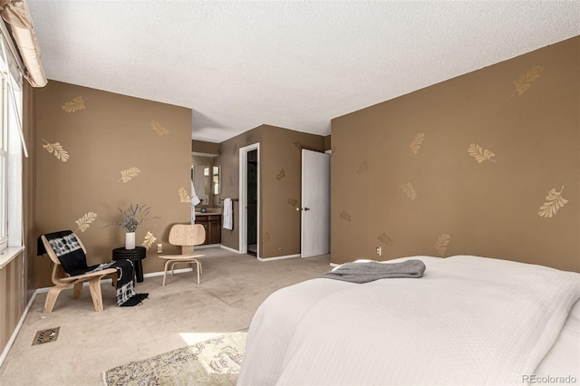 carpeted bedroom with a textured ceiling