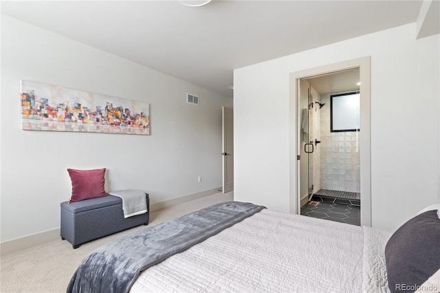 bedroom featuring carpet floors and ensuite bath