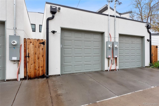 garage with fence