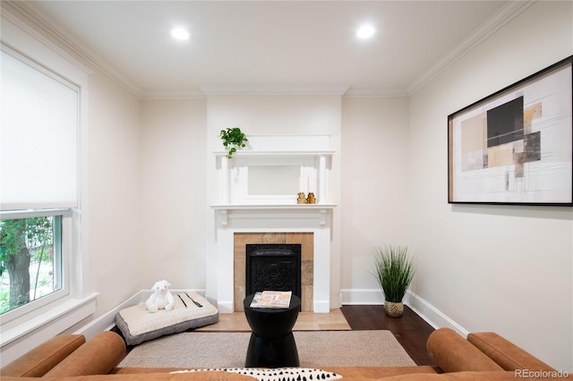 3071 W 38th Ave, Denver, CO 80211 - living area with wood finished floors, crown molding, a fireplace, recessed lighting, and baseboards