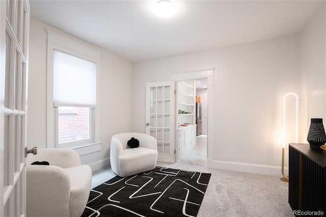 3071 W 38th Ave, Denver, CO 80211 - sitting room featuring light carpet and baseboards