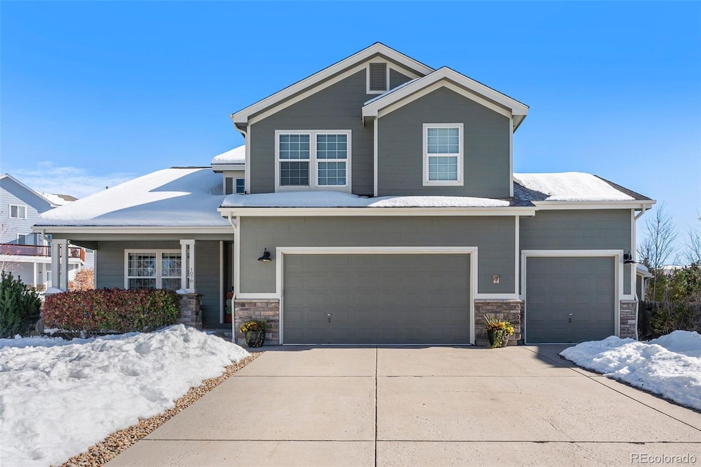 view of front of property featuring a garage