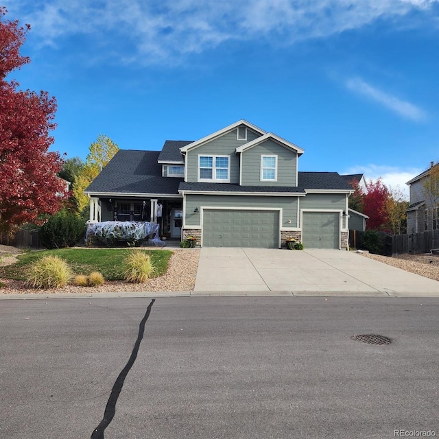 view of front of property with a garage